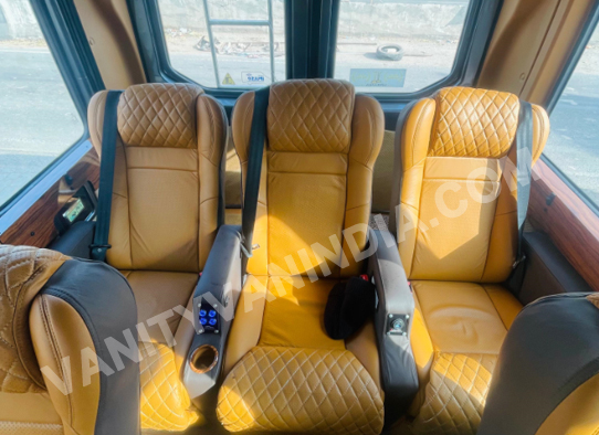 9 seater premium force urbania van with 1x1 massager recliner motorized seats hire in delhi